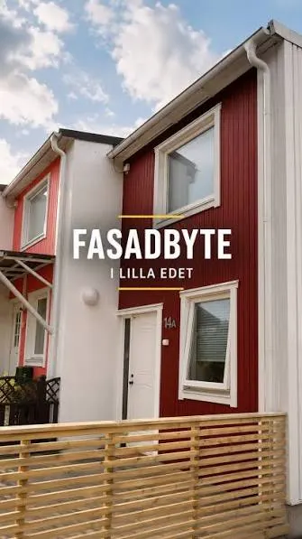 Rött och vitt radhus med nymålad fasad och nytt staket